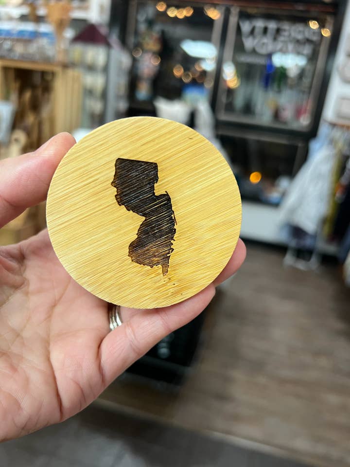 Custom State Shape Wood Engraved Round Bottle Opener for wholesale by Pretty Handy