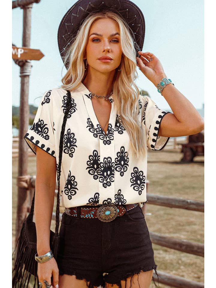As shown Fashion-W Boho Geometric Print Short Sleeve V Neck Blouse for wholesale on Faire