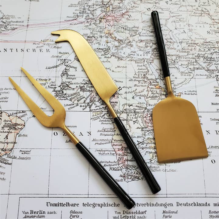 Gibb & Daan – Engroshandel Ostespreder – Sort og guld ostegaffel, kniv og skovl - Charcuterie