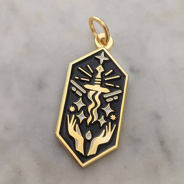 Dagger charm | Gold plated enamel | Symbol of Courage for wholesale by Vox Intra