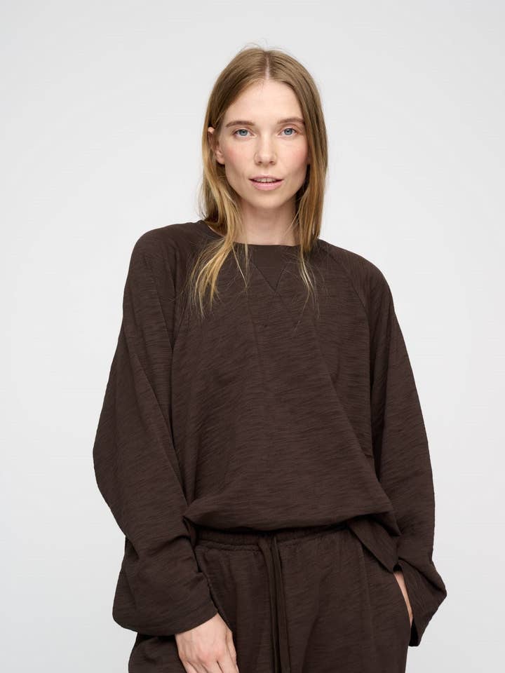 dark brown earth sweat for wholesale on Faire0