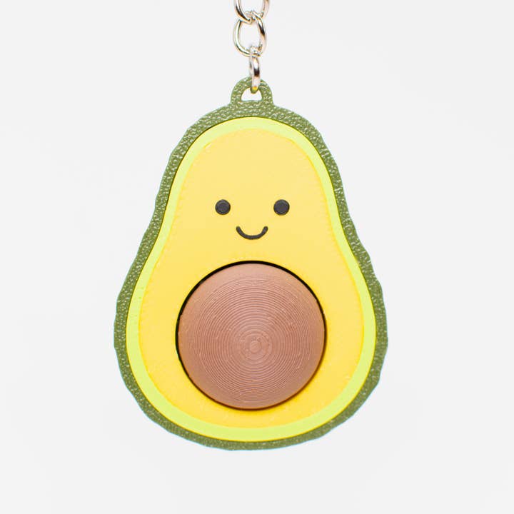 Cuddly Clicky Avocado Keychain for wholesale by The Tiny Joy Factory