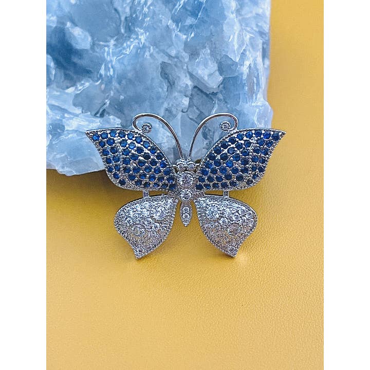 JohnnyB Jewelry – alfinete de lapela por atacado – BELLORA - Broche de borboleta azul safira CZ em prata
