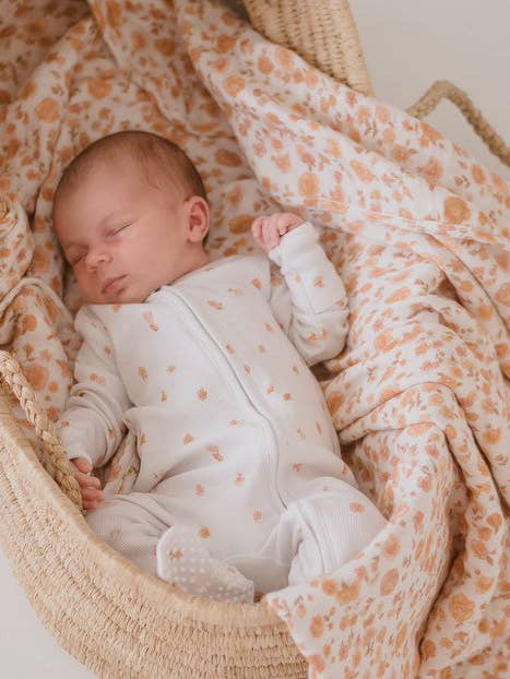 White Floral Romper for wholesale by Mae and Rae Bows