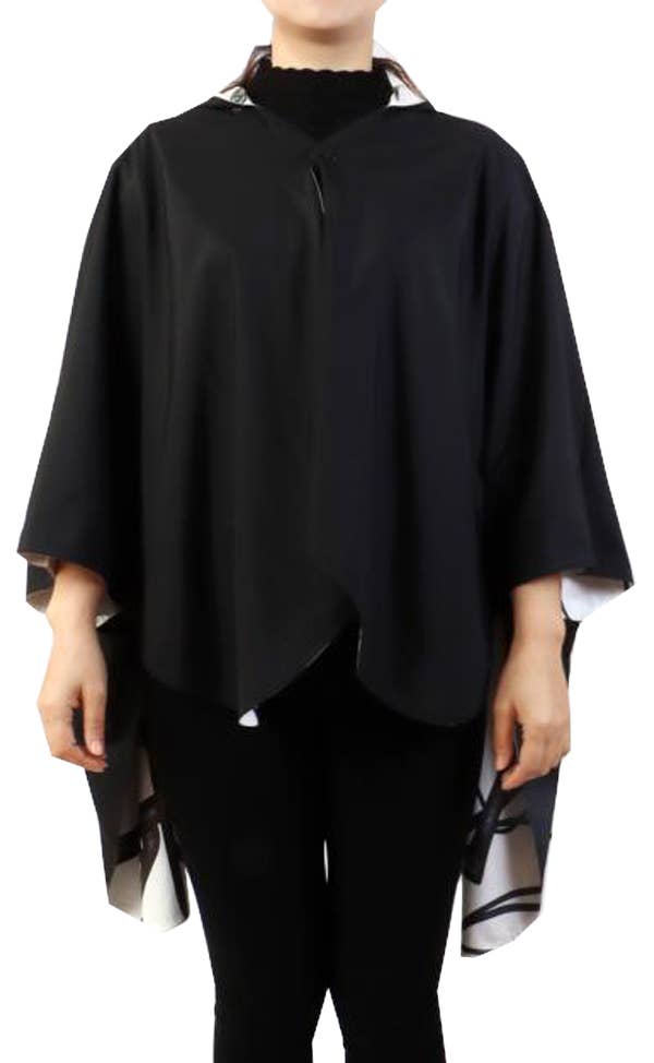 Winding River – wholesale Regnrock - Dam – Vändbar poncho med hästmotiv, svart/vit, vattentät1