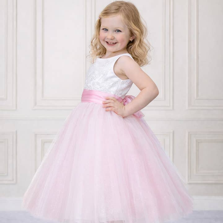 Beautiful flower girl dress with pink glitter tulle for wholesale by Bajabella