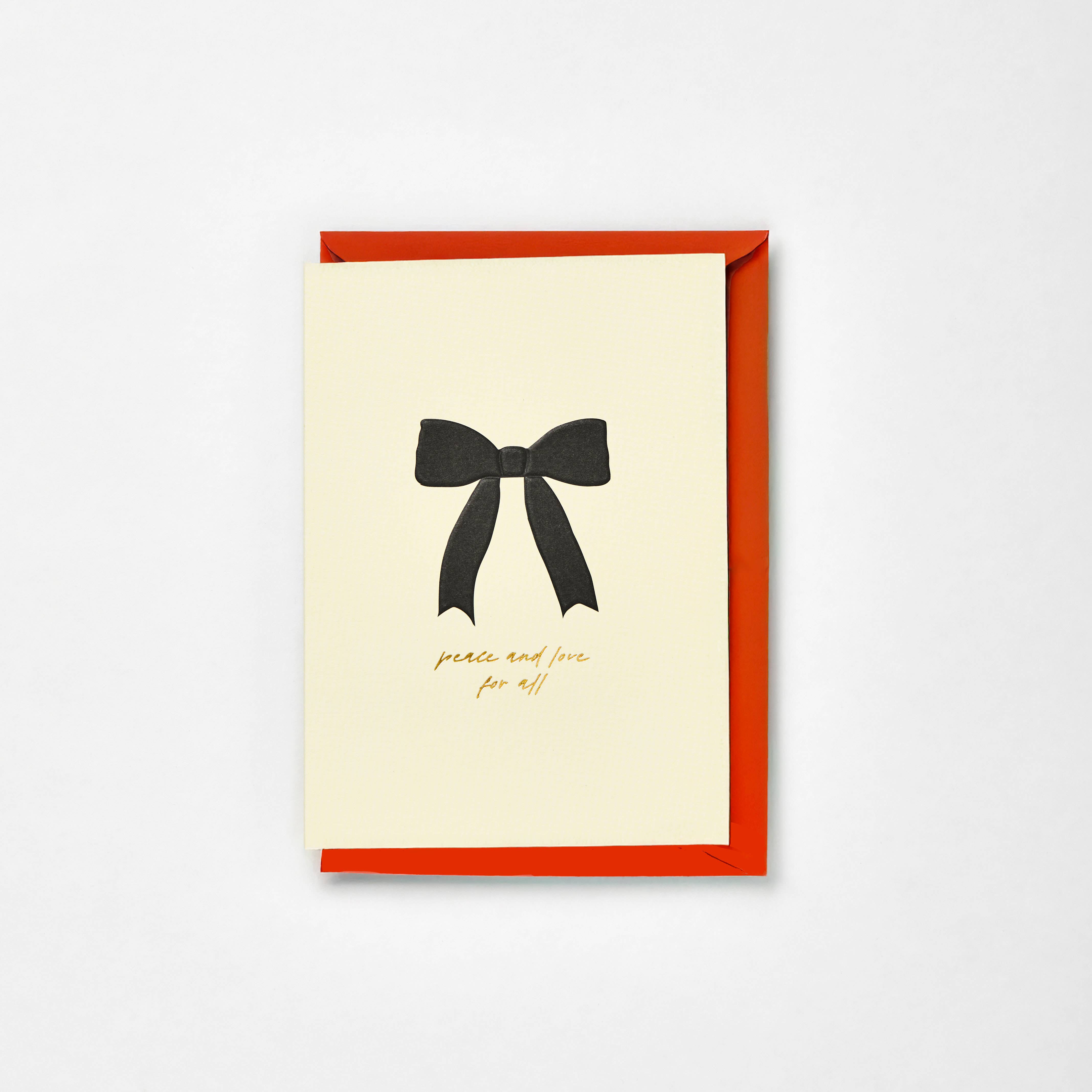 Kinshipped – wholesale Christmas card – Embossed & Gold Foiled 'Peace and love for all' bow card1
