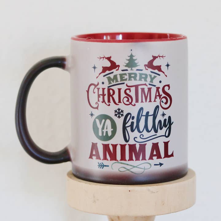 Merry a Christmas You Flithy Animal 11 oz mug for wholesale by Beeuteefull Designs