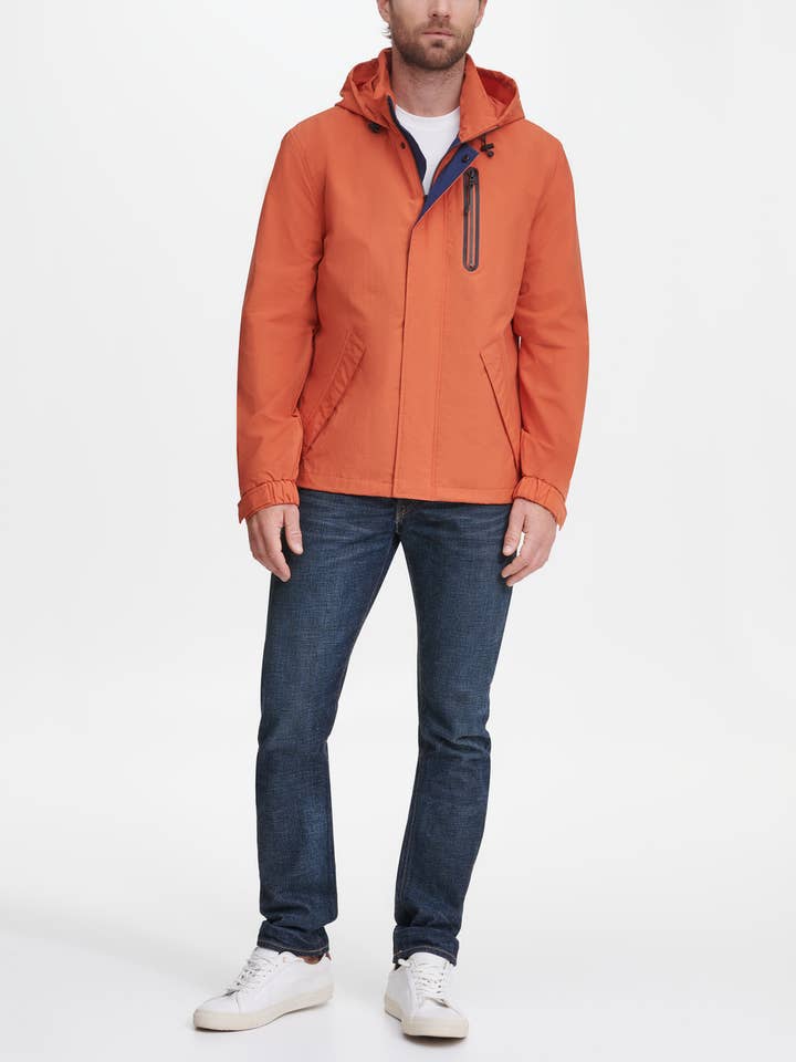 Veste de pluie sportive avec capuche cachée pour la vente par Cole Haan