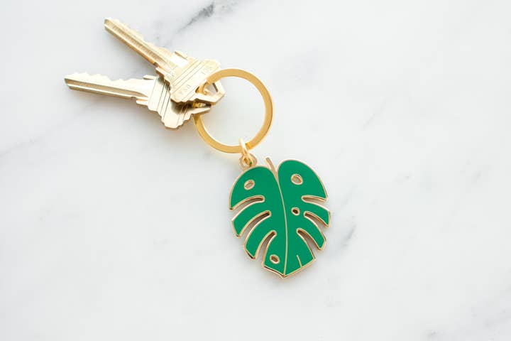 Gold green Monstera Leaf Keychain for wholesale on Faire0