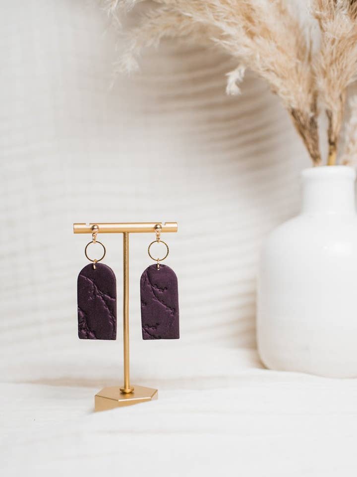 Dark Purple Floral Stamped Dangles for wholesale by Rielle & Co.
