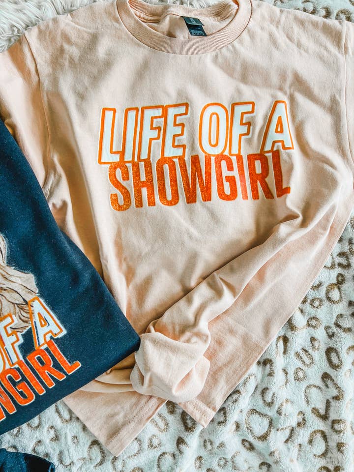 RR Tees Wholesale - Wholesale Screen Printed T-Shirt - Women's - Life of a Showgirl peach tee0