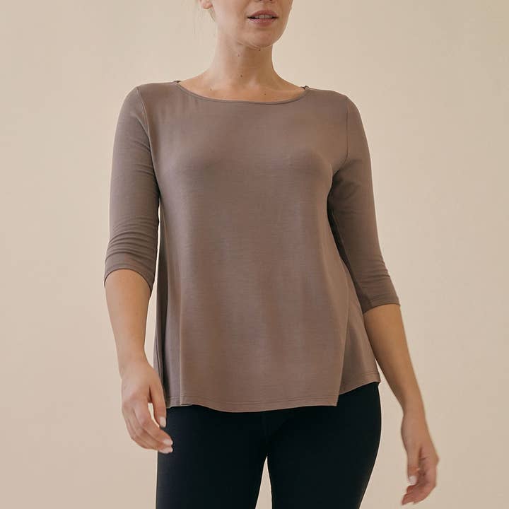 BAMBOO ELBOW SLEEVE TOP and other Purchase Wholesale kort. Free Returns & Net 60 Terms on Faire trending on Faire.