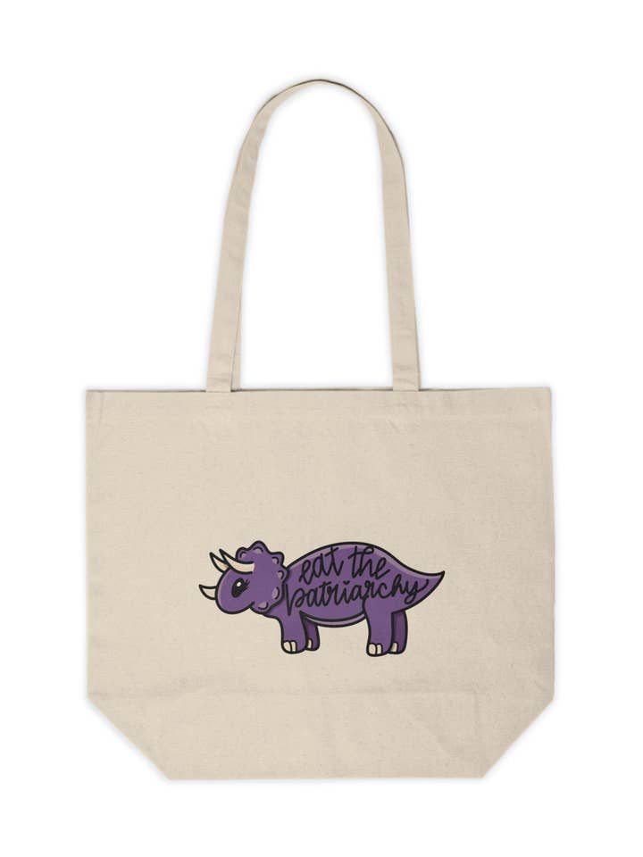 Eat The Patriarchy, Funny Feminist Tote Bag, Unique Dinosaur Tote, Female Empowerment, Purple Dinosaur, Snarky Gift for Her for wholesale by Cedar and Saltwater Co