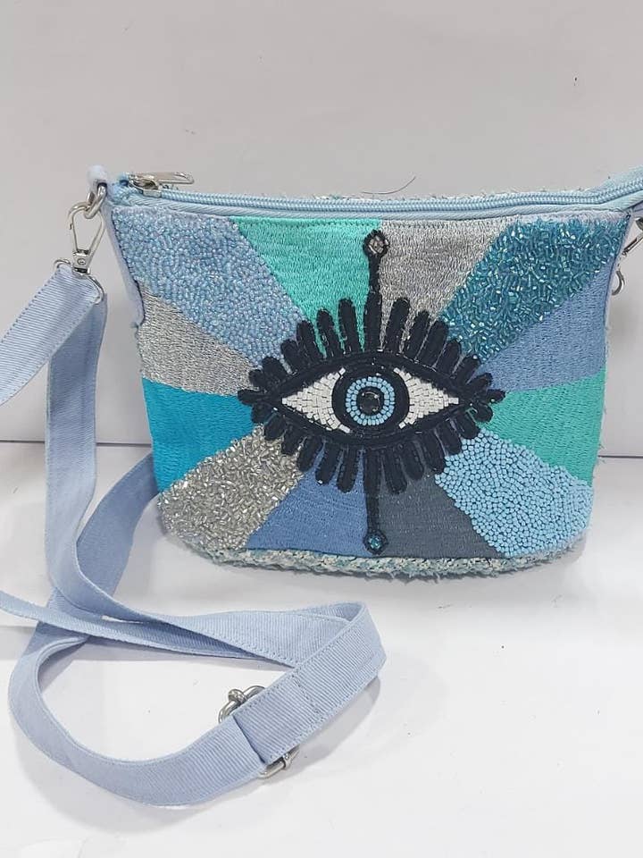 Boho eye messenger-taske. for engroshandel hos Ranee's Accessories
