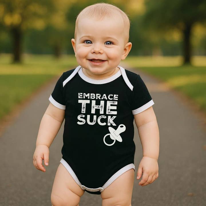 Embrace The Suck Baby Bodysuit for wholesale by Trooper Clothing