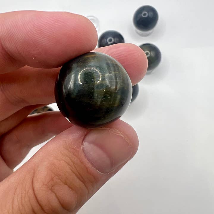 Oils and Auras - Wholesale Spiritual Stone/Crystal - Mini Hawkeye Sphere2