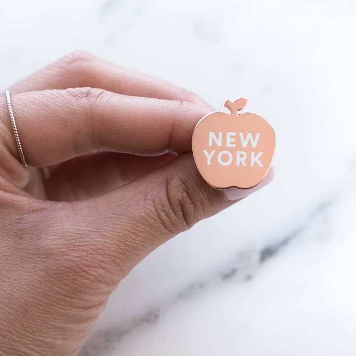 Gold black New York Apple Pin for wholesale on Faire2