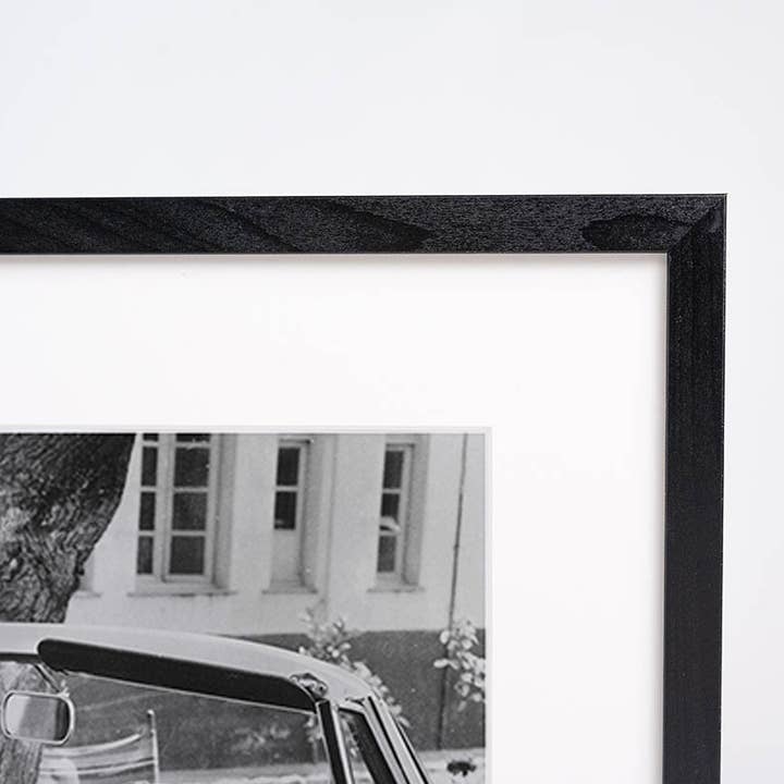 Black Brigitte Bardot Al Volante. Wall art print with frame. for wholesale on Faire3