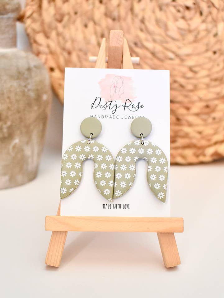Sage Daisy Arch Dangles for wholesale by Dusty Rose Creations