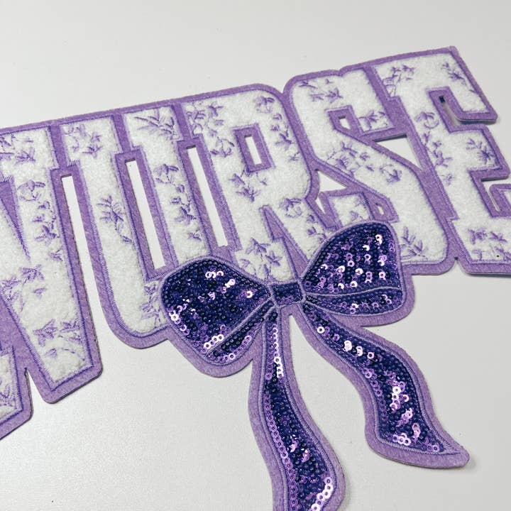 TEELUX - Wholesale Patch - 11" Nurse with sequin bow and embroidered Floral Purple - Sequin & Chenille Patch1