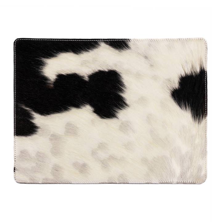 set de table en peau de vache rectangulaire noir/blanc 30x40cm pour la vente par Mars & More - Brand of B Living