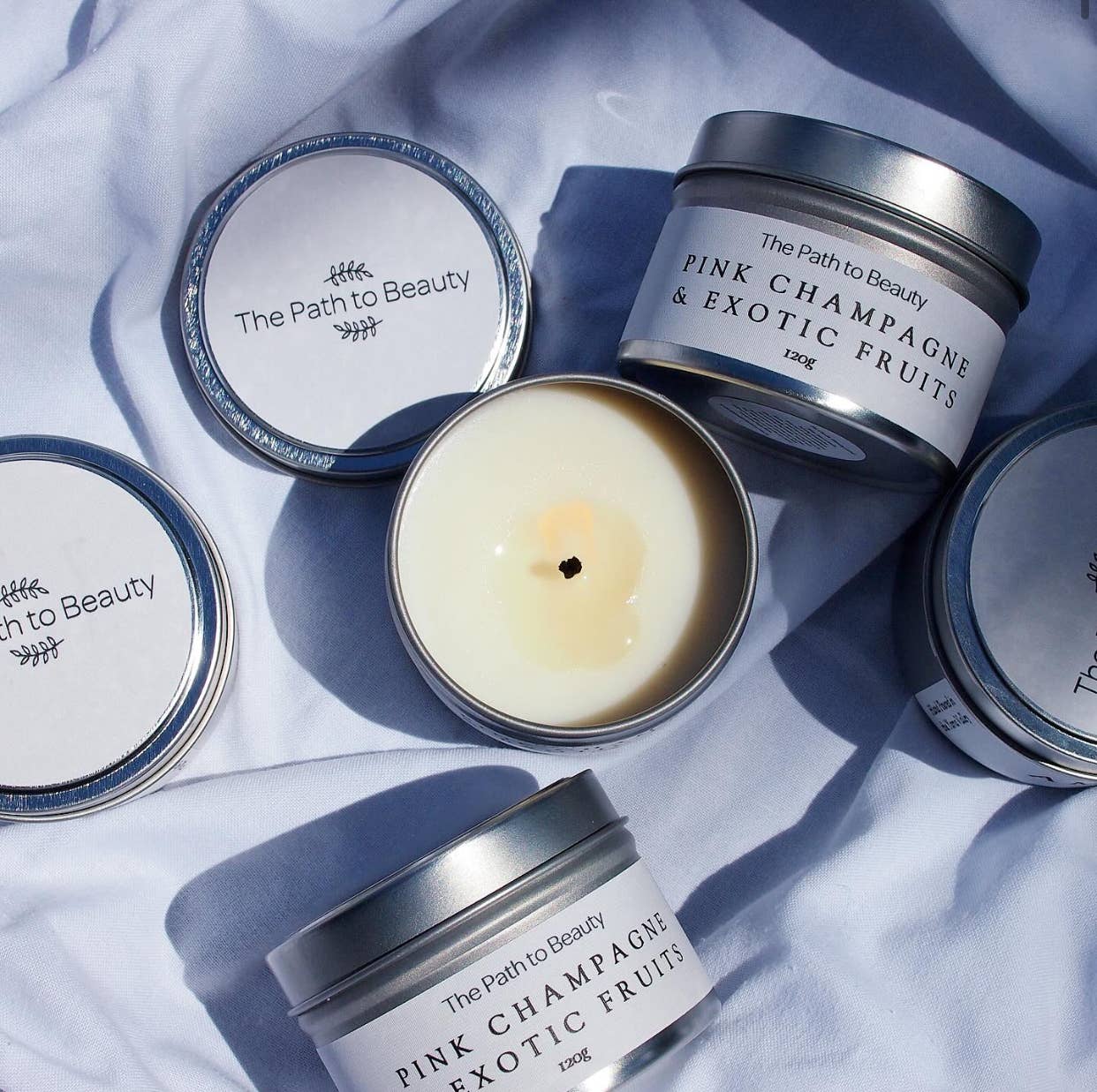 The Path to Beauty - Wholesale Travel candles - Pink Champagne & Exotic Fruits Candle Tin1