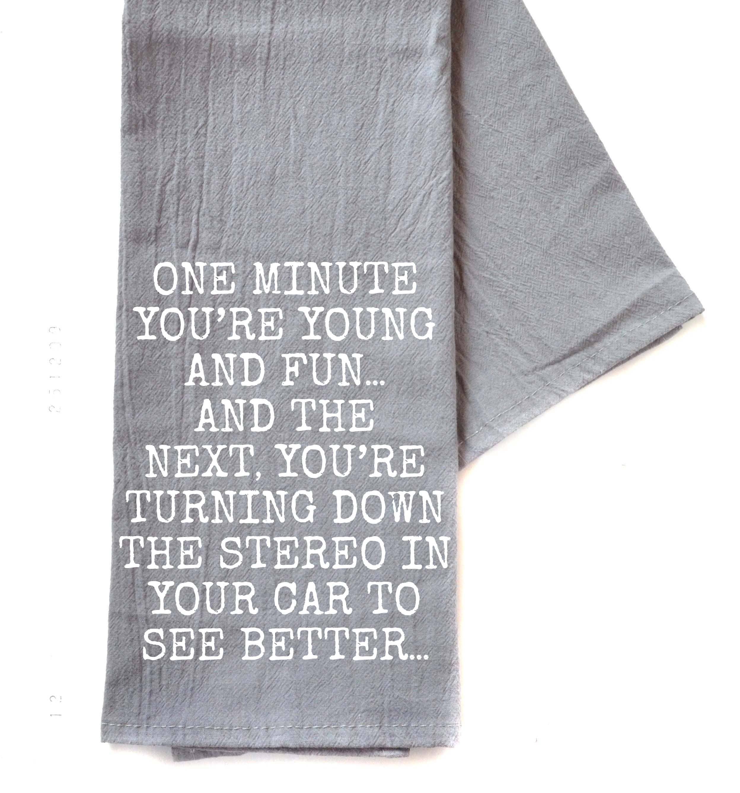 Driftless Studios - Wholesale Tea Towel - One Minute You're Young And Fun Gray Funny Tea Towels 20250