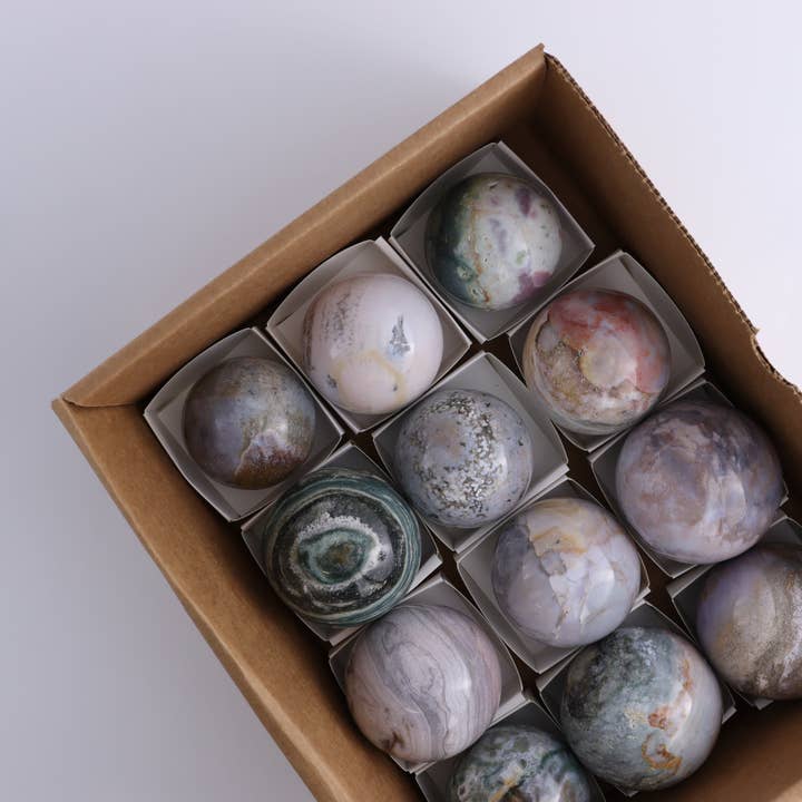 Ocean Jasper Spheres Set of 12 and other Purchase Wholesale cascara espelta. Free Returns & Net 60 Terms on Faire trending on Faire.