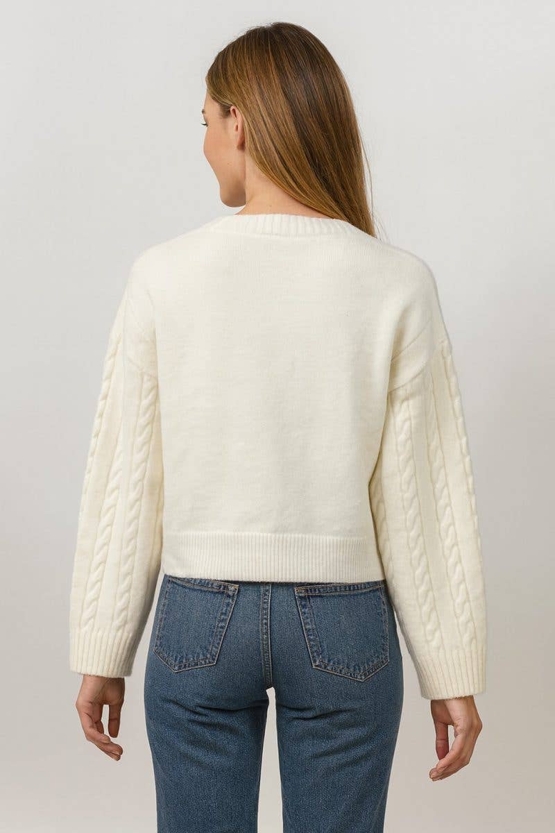 IVOIRE Pull en maille torsadée avec ancres en vente sur Faire1