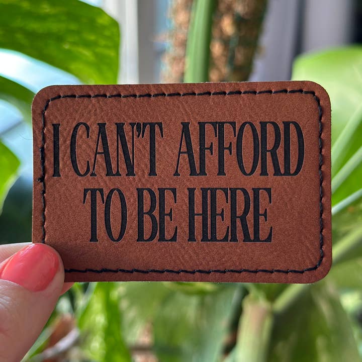 I cant afford to be here lasered leatherette patch for wholesale by Simply Gideon