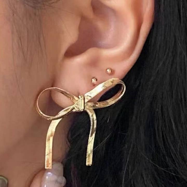 NINEXIS - Wholesale Dangle Earrings - CWAJE1209_THE BOW IS STUD 18K GOLD PLATED EARRINGS