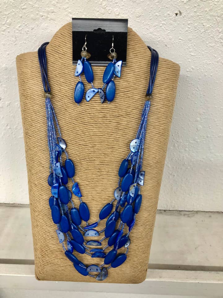 CORDON CIRÉ BLEU À 4 BRINS AVEC BOIS AVEC PERLES DE ROCAILLE BLEUES ET S pour la vente par International Duru's