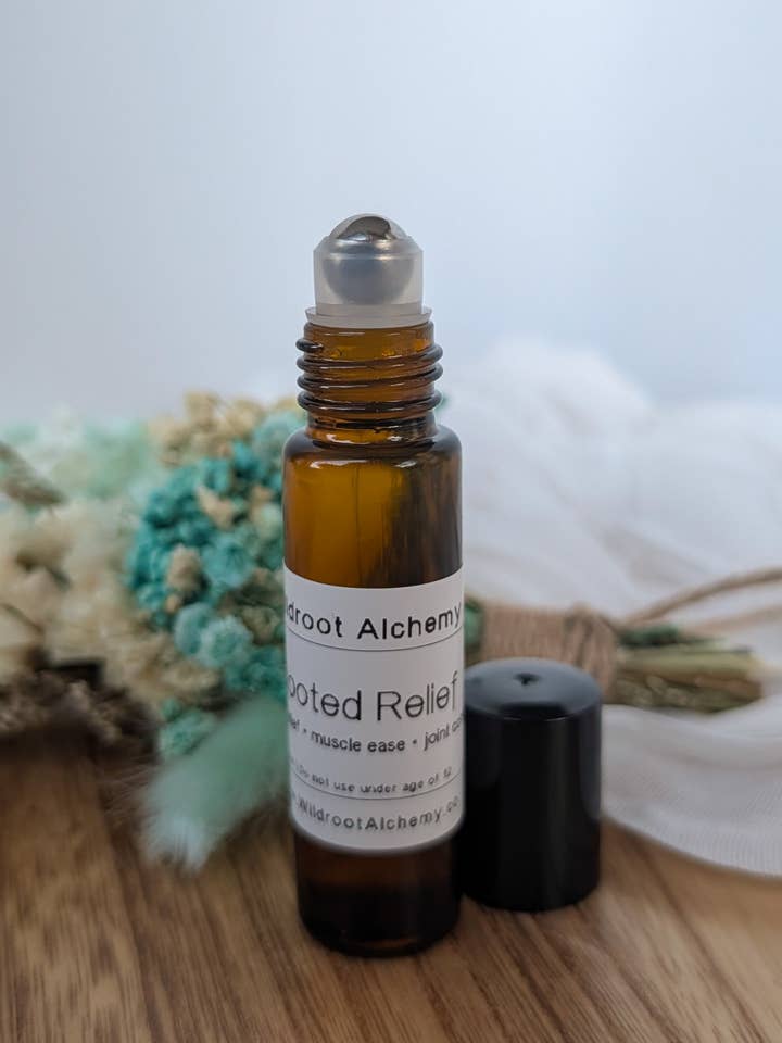 Rooted Relief 10ml Roller • Pain Support Oil for wholesale by Wildroot Alchemy