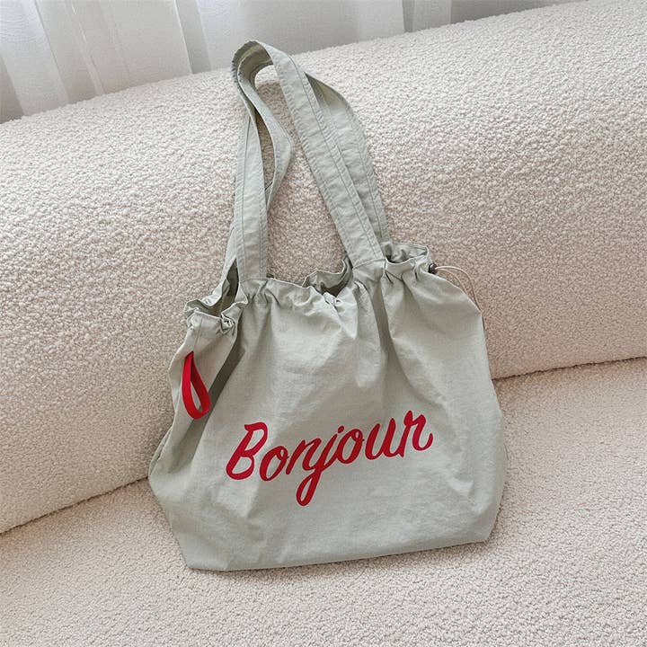 NINEXIS - Wholesale Tote Bag - Women's - CWAB3903_LETTERING PRINT DRAWSTRING SHOULDER BAG