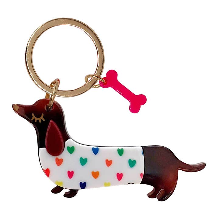 Portachiavi "Bassotto" marrone a fantasia con maglione bianco per la vendita all'ingrosso da parte di Mea-Living