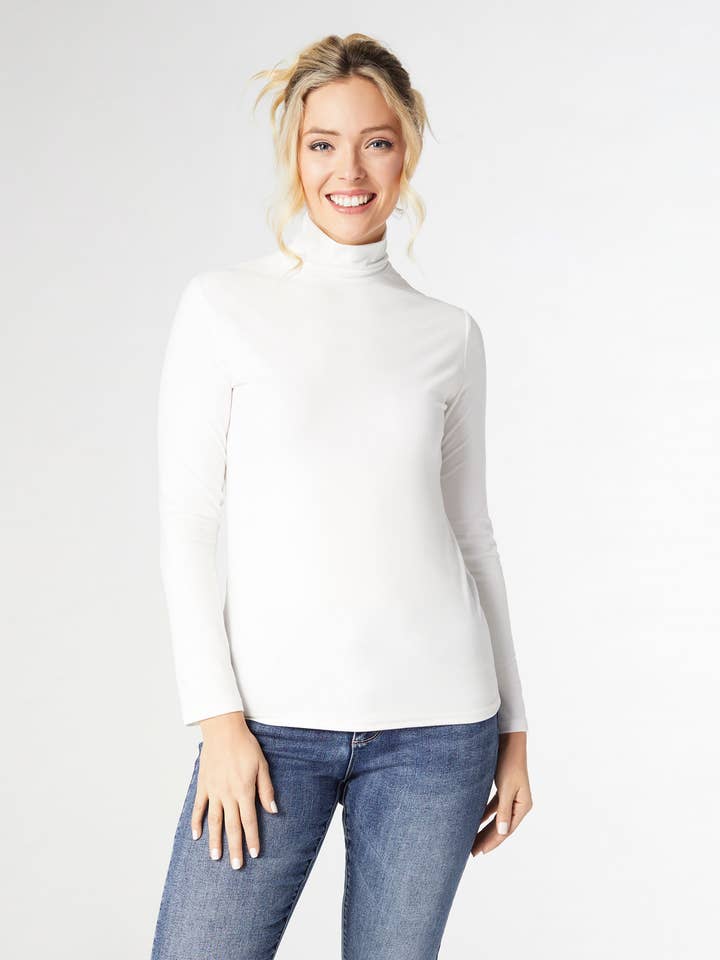 Reign Long Sleeve Turtleneck and other Purchase Wholesale black turtleneck. Free Returns & Net 60 Terms on Faire trending on Faire.