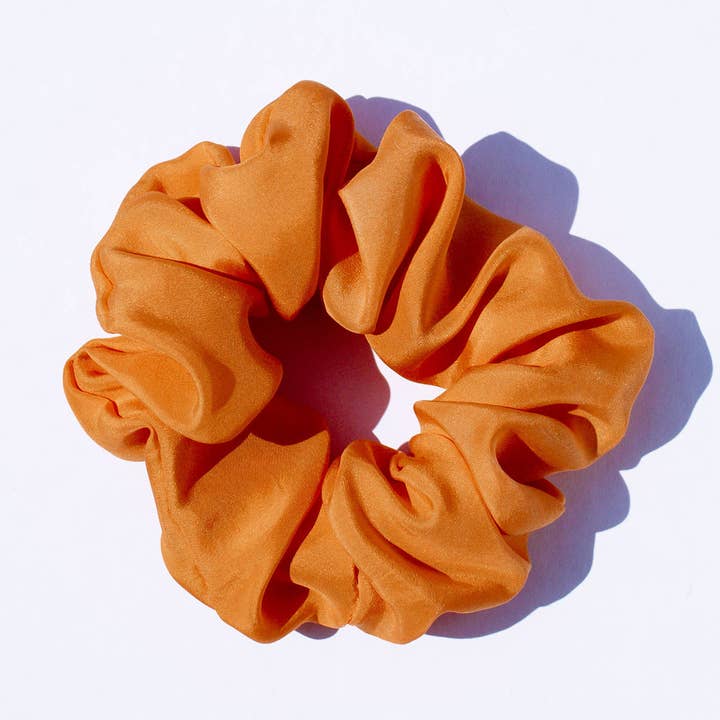 The Clara Silk Scrunchie - Annatto Seed Orange for wholesale by This is Brennan