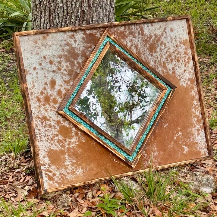 Cowhide Diamond shaped mirror // genuine cowhide mirror // western bedroom mirror // living room decor // ranch decor // and other Purchase Wholesale framed mirrors. Free Returns & Net 60 Terms on Faire trending on Faire.