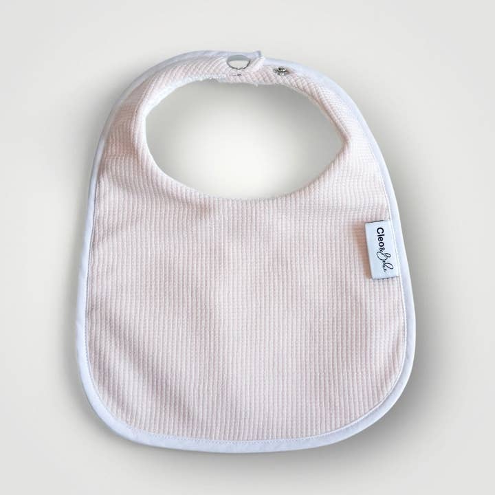Waterproof Bib Classic - Pink Waffle for wholesale by Cleo & Bebe