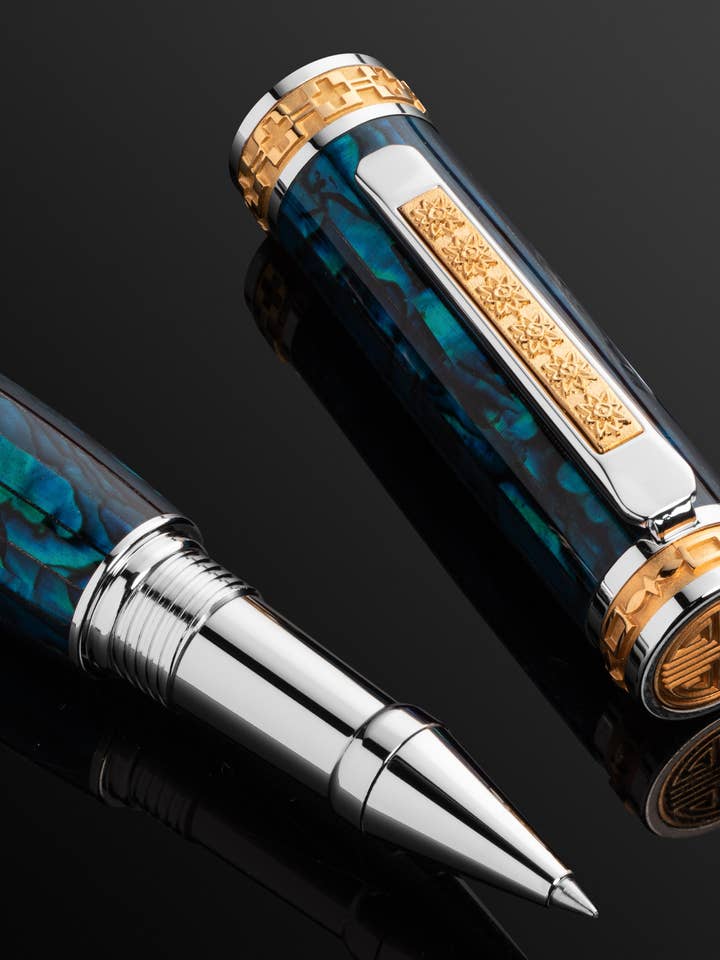 PITCHMAN CLOSER™ TEAL ROLLERBALL PEN - Handcrafted of colored Teal Paua Abalone Shell, 22 Kt Gold, and Rhodium - Limited Production for wholesale by Pitchman®
