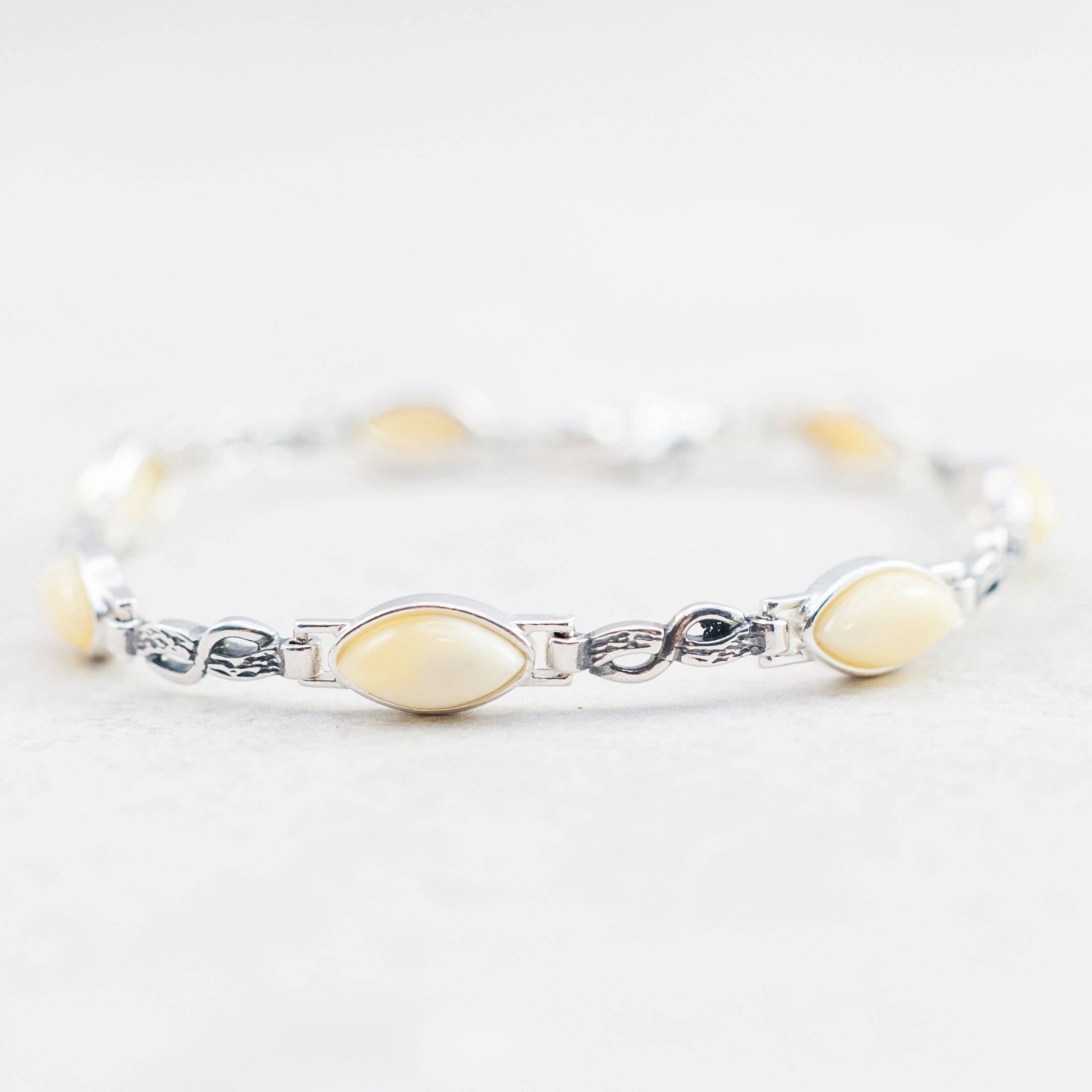 Marcin Waryszak - Vendita all'ingrosso Bracciali tennis - Bracciale in ambra caramellata, braccialetto in argento con maglie a forma di infinito0