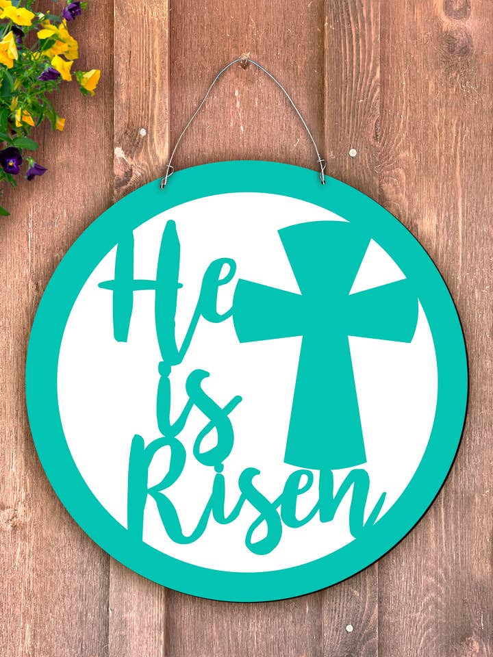 He is Risen Circle Door Hanger for wholesale by Steel Southern Designs