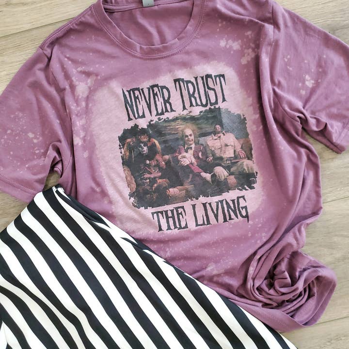 Never Trust The Living Graphic Tee Halloween for wholesale by Funk Town Tees