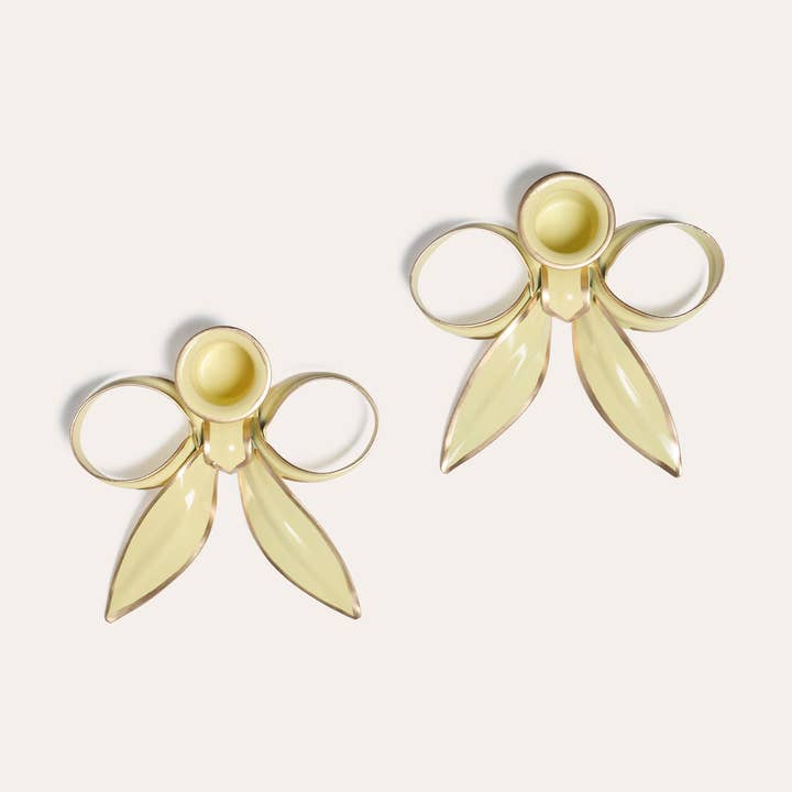 A Pair of Bow Candleholders | Soft Yellow for wholesale by Tooka