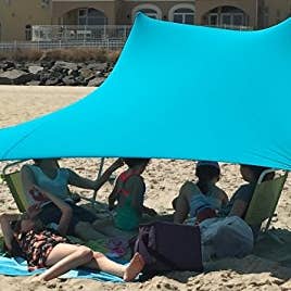 eZthings UV Light Sun Shade Protection Beach Shelters - Lightweight Tent Canopy with Sandbag Anchors for wholesale on Faire5