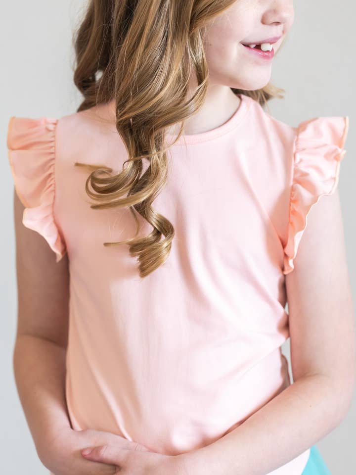 Peach S/S Ruffle Tee for wholesale by Mila & Rose