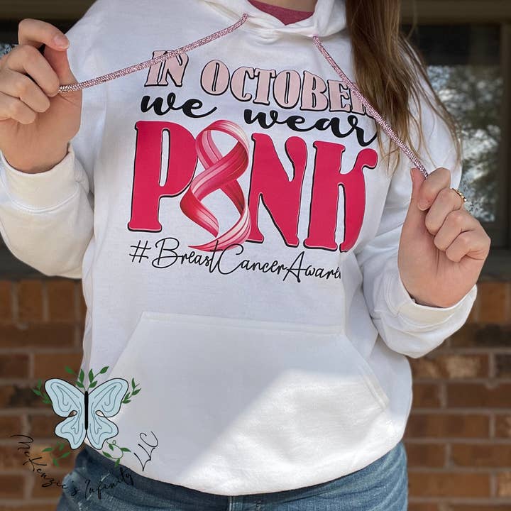 In October We Wear Pink-Breast Cancer Hooded Sweatshirt for wholesale by McKenzie’s Infinity LLC