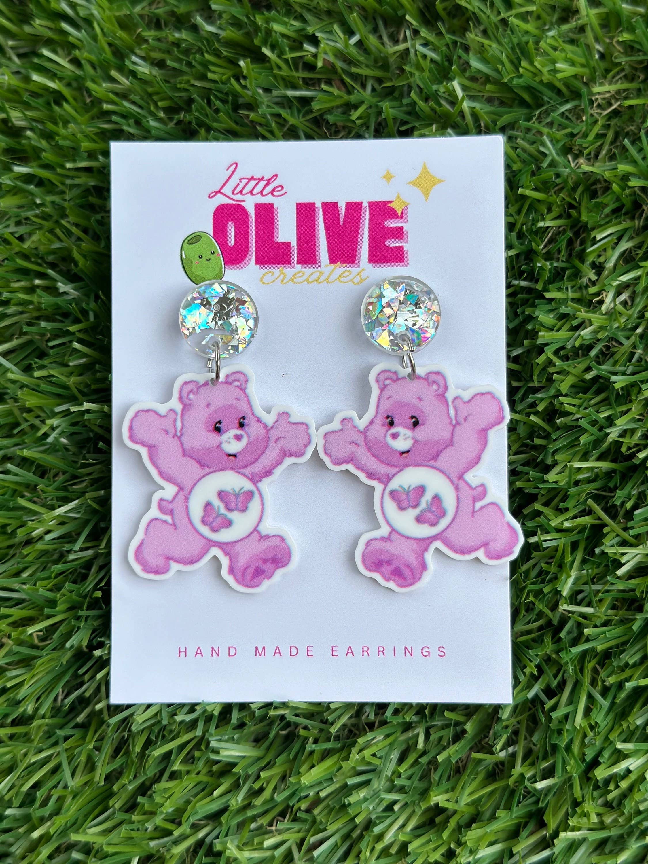 Little Olive Creates - Wholesale Hangende/ronde oorbellen - Sprookjesachtige paarse vlinder Care Bear oorbellen2