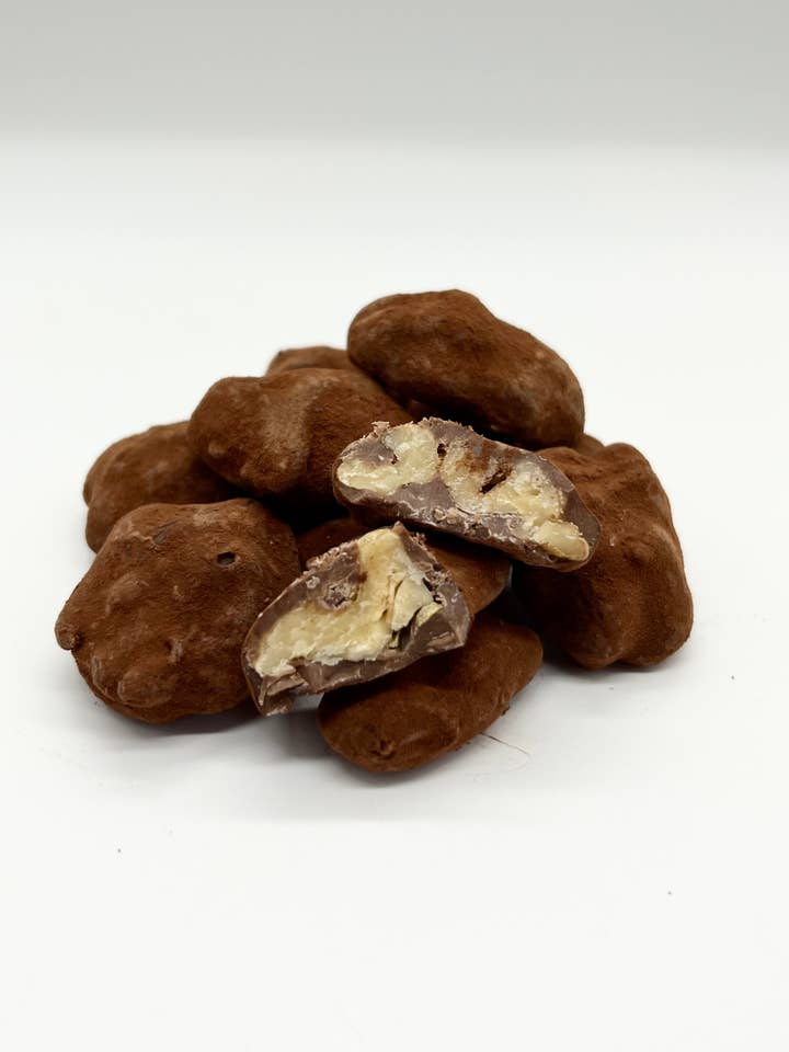 Walnuts in Milk Chocolate for wholesale by Gorvett and Stone